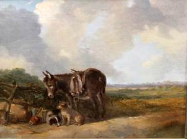 Donkey and Two Dogs in a rural landscape